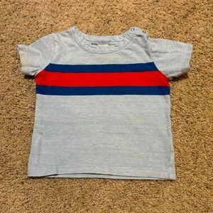 Tucker + Tate Blue and Red Tee Shirt, size 6 months. Has snaps at the shoulder.